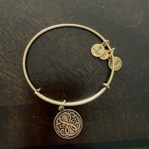 Alex and Ani gold bracelet and Infinity charm